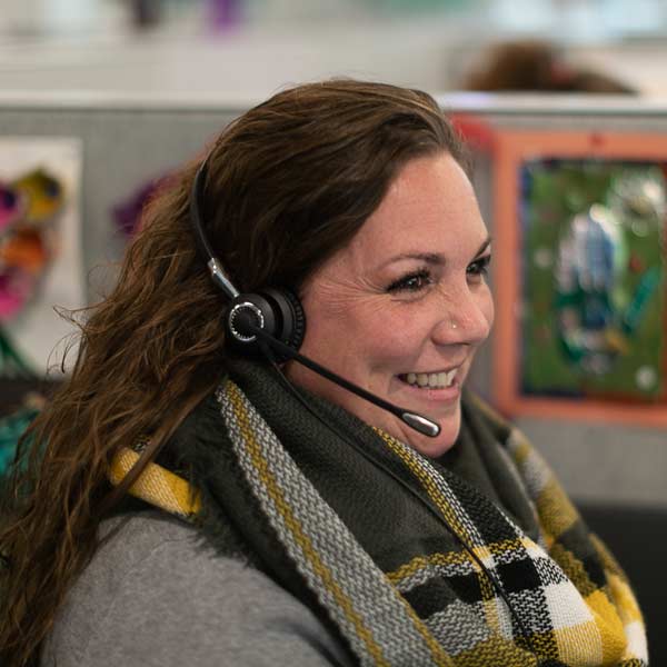 A LimoLink employee with headset